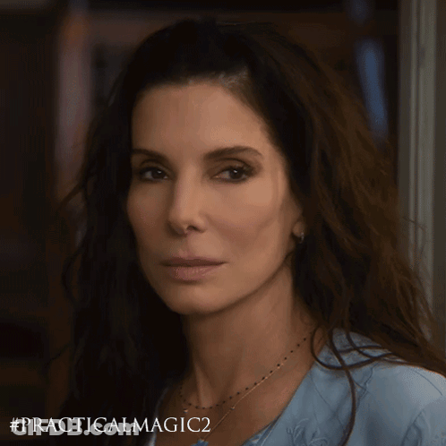 A Close Up Of A Woman 'S Face With # Practicalmagic2 Written Below Her GIF