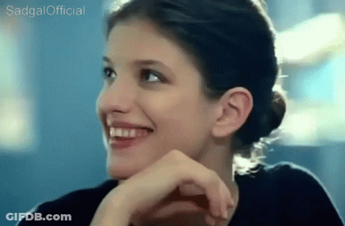 A Close Up Of A Woman 'S Face With Sadgal Official Written Above Her GIF
