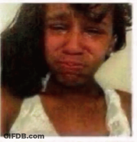 A Close Up Of A Woman 'S Face With Tears Running Down Her Face GIF