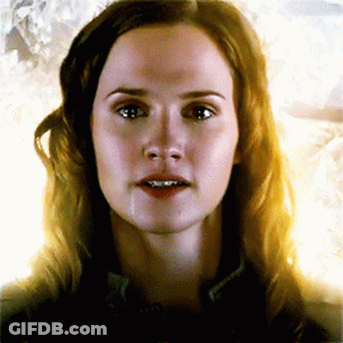 A Close Up Of A Woman 'S Face With Tears Running Down Her Face GIF