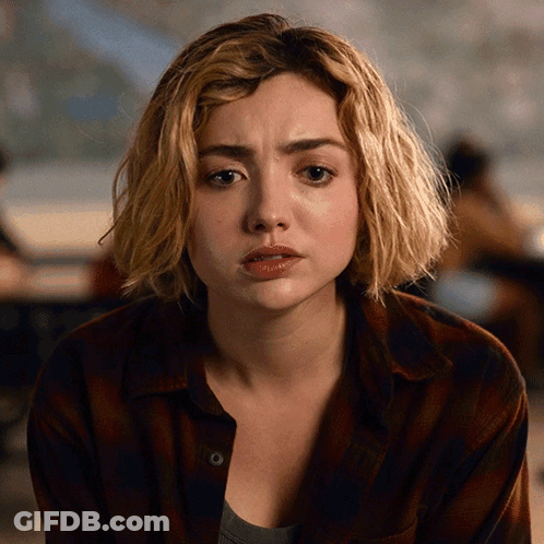 A Close Up Of A Woman 'S Face With Tears Running Down Her Face GIF