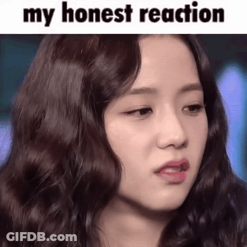 A Close Up Of A Woman 'S Face With The Caption `` My Honest Reaction '' . GIF