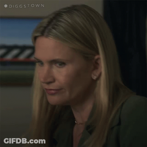 A Close Up Of A Woman 'S Face With The Hashtag #Diggstown On The Bottom GIF