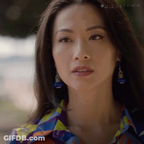 A Close Up Of A Woman 'S Face With The Hashtag #Diggstown Visible GIF
