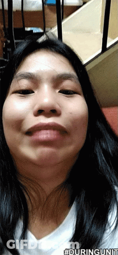 A Close Up Of A Woman 'S Face With The Hashtag #Duringunit On The Bottom GIF