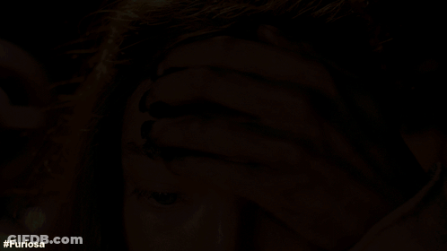 A Close Up Of A Woman 'S Face With The Hashtag Furiosa On The Bottom GIF