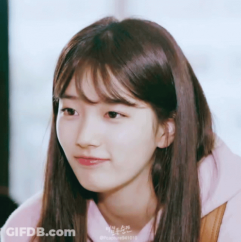A Close Up Of A Woman 'S Face With The Hashtag Pccapture941010 On The Bottom GIF