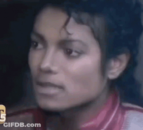 A Close Up Of A Woman 'S Face With The Letter G On The Bottom Right GIF