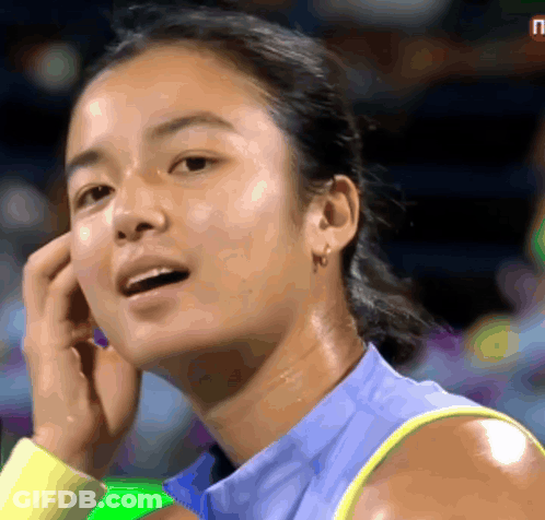 A Close Up Of A Woman 'S Face With The Letter P Visible GIF