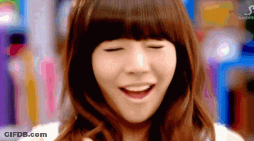 A Close Up Of A Woman 'S Face With The Letter S On The Bottom Left GIF