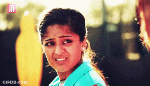 A Close Up Of A Woman 'S Face With The Letters Ii On It GIF