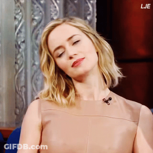 A Close Up Of A Woman 'S Face With The Letters Lje On The Bottom Right GIF
