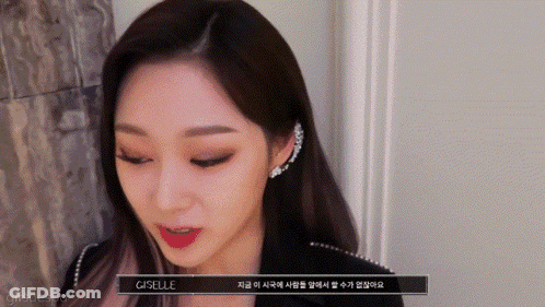 A Close Up Of A Woman 'S Face With The Name Giselle On The Bottom Right GIF