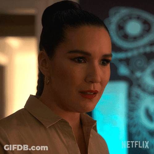 A Close Up Of A Woman 'S Face With The Netflix Logo In The Corner GIF