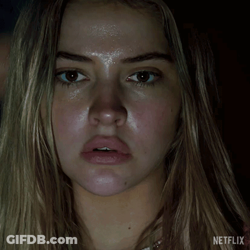 A Close Up Of A Woman 'S Face With The Netflix Logo Visible GIF