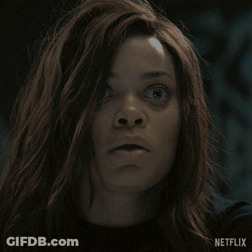 A Close Up Of A Woman 'S Face With The Netflix Logo Visible GIF