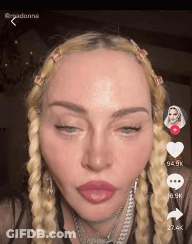A Close Up Of A Woman 'S Face With The Number 27.4K On The Bottom GIF