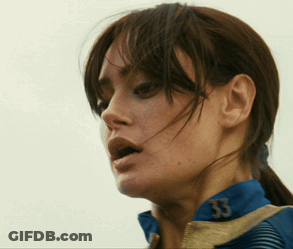 A Close Up Of A Woman 'S Face With The Number 53 On Her Jacket GIF