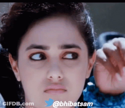 A Close Up Of A Woman 'S Face With The Twitter Username @Bhibatsam Visible GIF