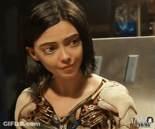 A Close Up Of A Woman 'S Face With The Word Alita Army In The Corner GIF