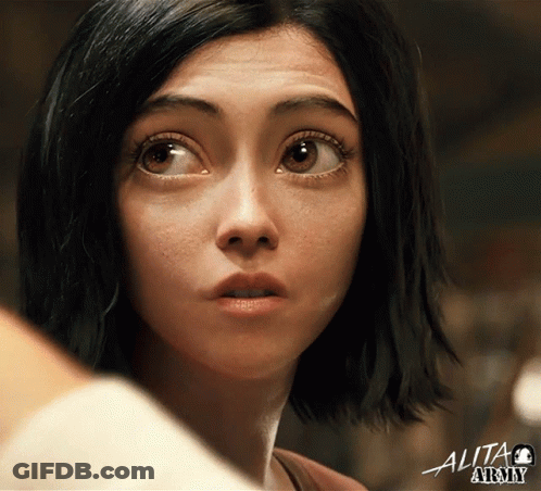 A Close Up Of A Woman 'S Face With The Word Alita Army On The Bottom Right GIF