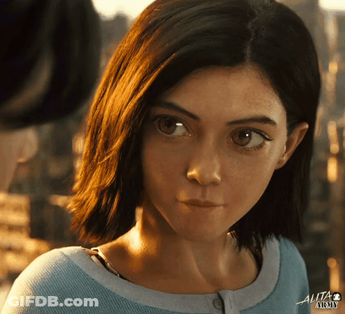 A Close Up Of A Woman 'S Face With The Word Alita At The Top GIF