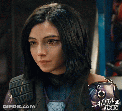 A Close Up Of A Woman 'S Face With The Word Alita At The Top GIF