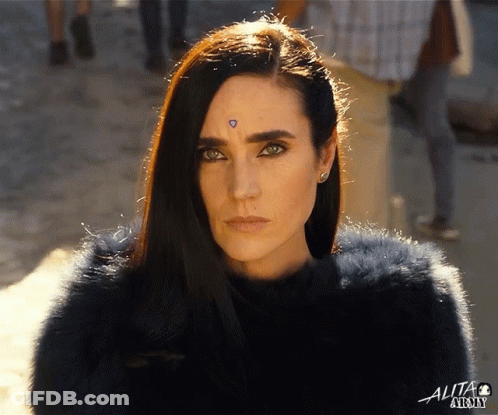 A Close Up Of A Woman 'S Face With The Word Alta On The Bottom Left GIF