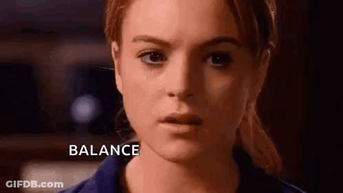 A Close Up Of A Woman 'S Face With The Word Balance Written On It . GIF