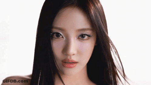 A Close Up Of A Woman 'S Face With The Word Gifs On The Bottom Left GIF