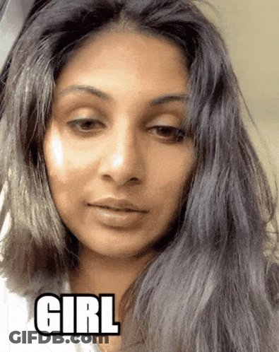 A Close Up Of A Woman 'S Face With The Word Girl Written On It GIF