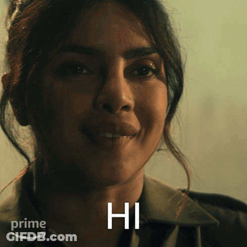 A Close Up Of A Woman 'S Face With The Word Hi In White GIF