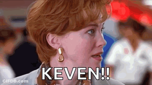 A Close Up Of A Woman 'S Face With The Word Keven Written On It . GIF