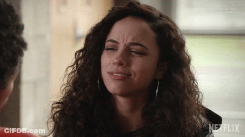 A Close Up Of A Woman 'S Face With The Word Netflix On The Bottom Right GIF