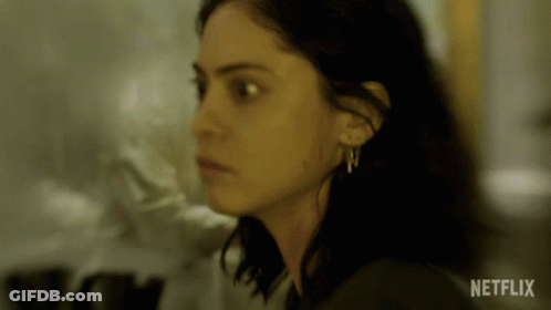 Close Up Of Woman's Face With Netflix Text GIF