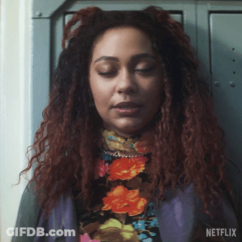 A Close Up Of A Woman 'S Face With The Word Netflix On The Bottom Right GIF