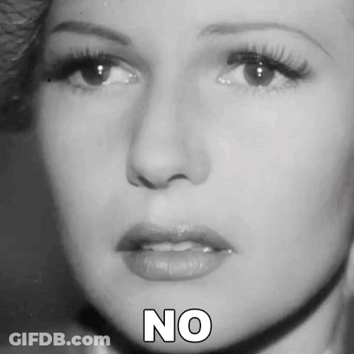 A Close Up Of A Woman 'S Face With The Word No Written Below Her GIF