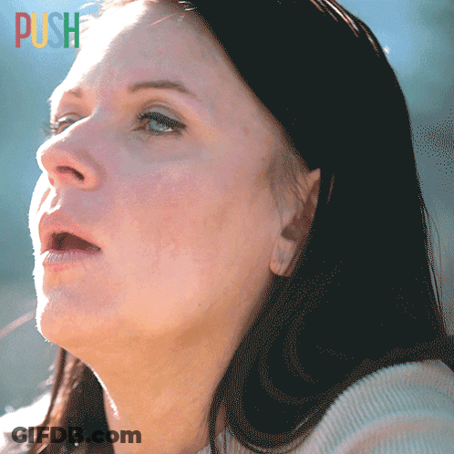 A Close Up Of A Woman 'S Face With The Word Push In The Corner GIF