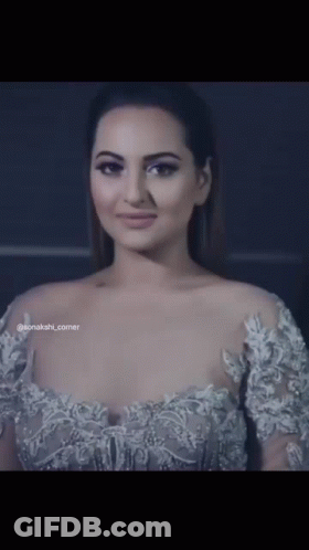 A Close Up Of A Woman 'S Face With The Word Sonakshi Corner On The Bottom GIF