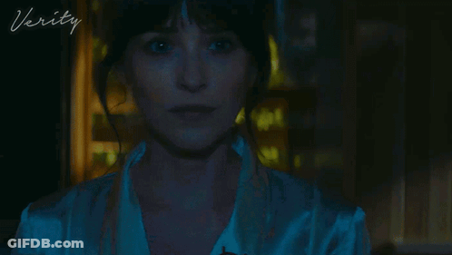 A Close Up Of A Woman 'S Face With The Word Verity On The Bottom Right GIF