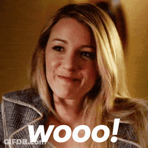 A Close Up Of A Woman 'S Face With The Word Wooo Written On The Bottom GIF