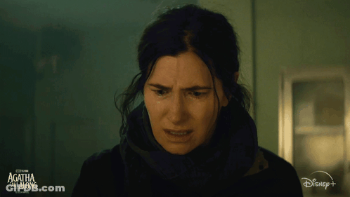A Close Up Of A Woman 'S Face With The Words Agatha Goes Along On The Bottom GIF