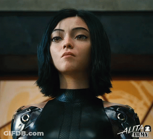 A Close Up Of A Woman 'S Face With The Words Alita Atomy On The Bottom GIF