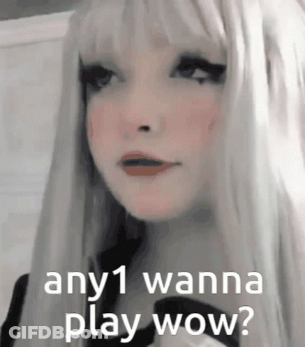 A Close Up Of A Woman 'S Face With The Words " Any1 Wanna Play Wow ? " GIF