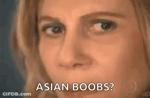 A Close Up Of A Woman 'S Face With The Words Asian Boobs . GIF