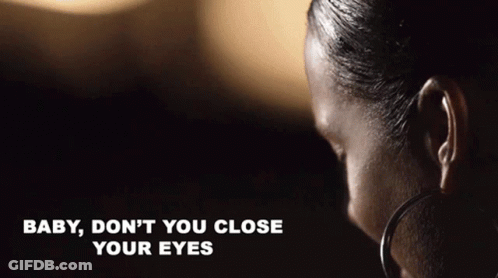 A Close Up Of A Woman 'S Face With The Words Baby , Don 'T You Close Your Eyes Written Below Her GIF