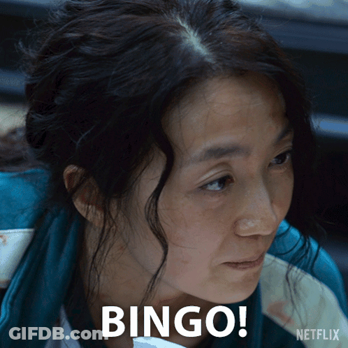 A Close Up Of A Woman 'S Face With The Words Bingo Written On It GIF