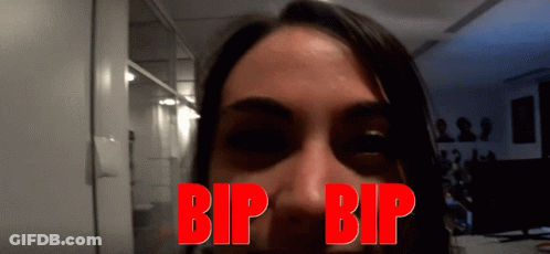 A Close Up Of A Woman 'S Face With The Words Bip Bip Written In Red GIF