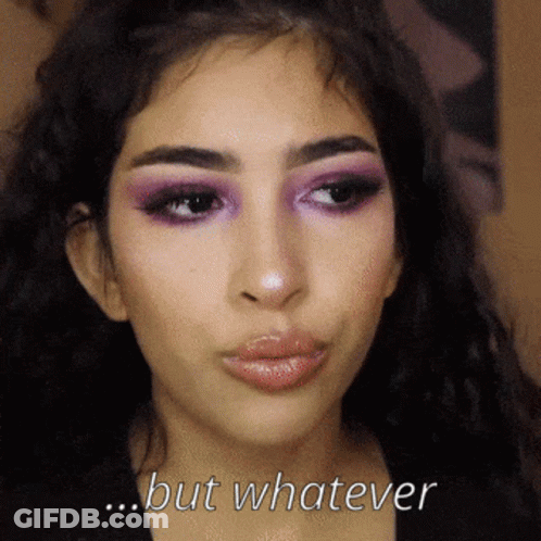 A Close Up Of A Woman 'S Face With The Words But Whatever Above Her GIF