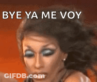 A Close Up Of A Woman 'S Face With The Words `` Bye Ya Me Voy '' Written On The Bottom . GIF